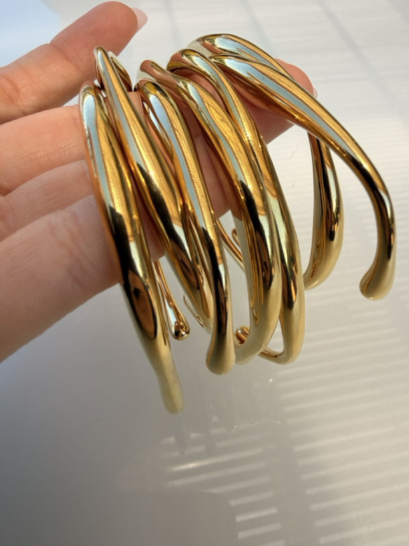 BRACCIALE RIGIDO FORME GEOMETRICHE VALIOSO